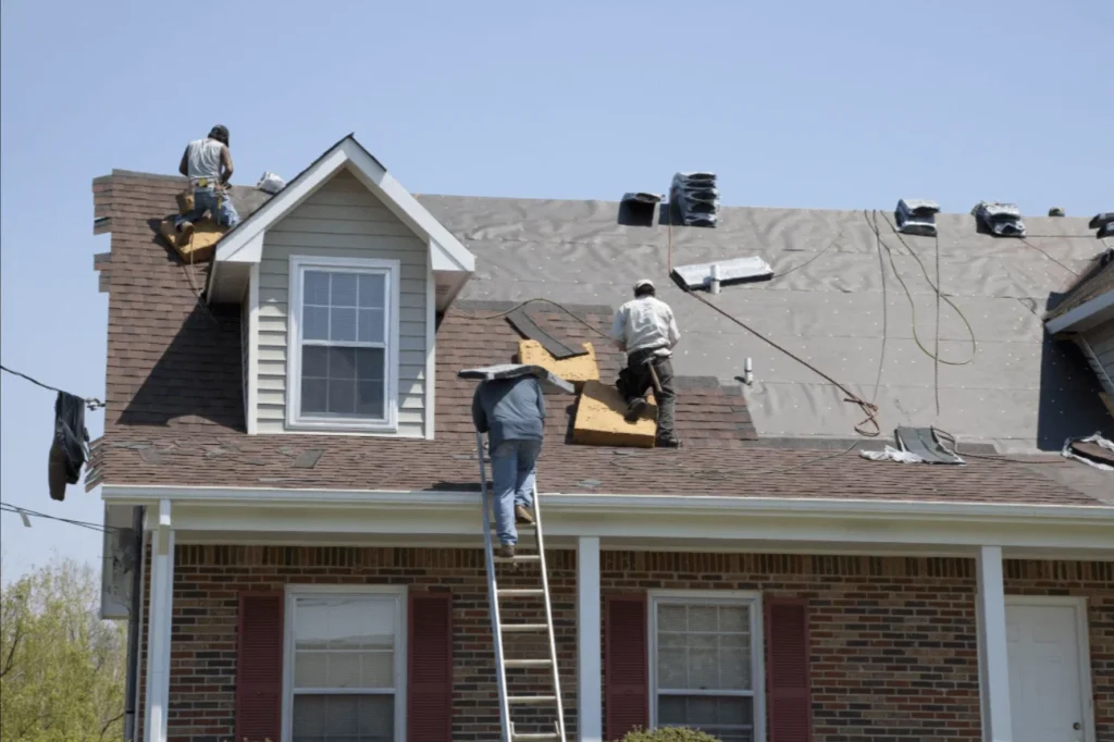 Workers repairing roof in Bishop Auckland Neighbourhood